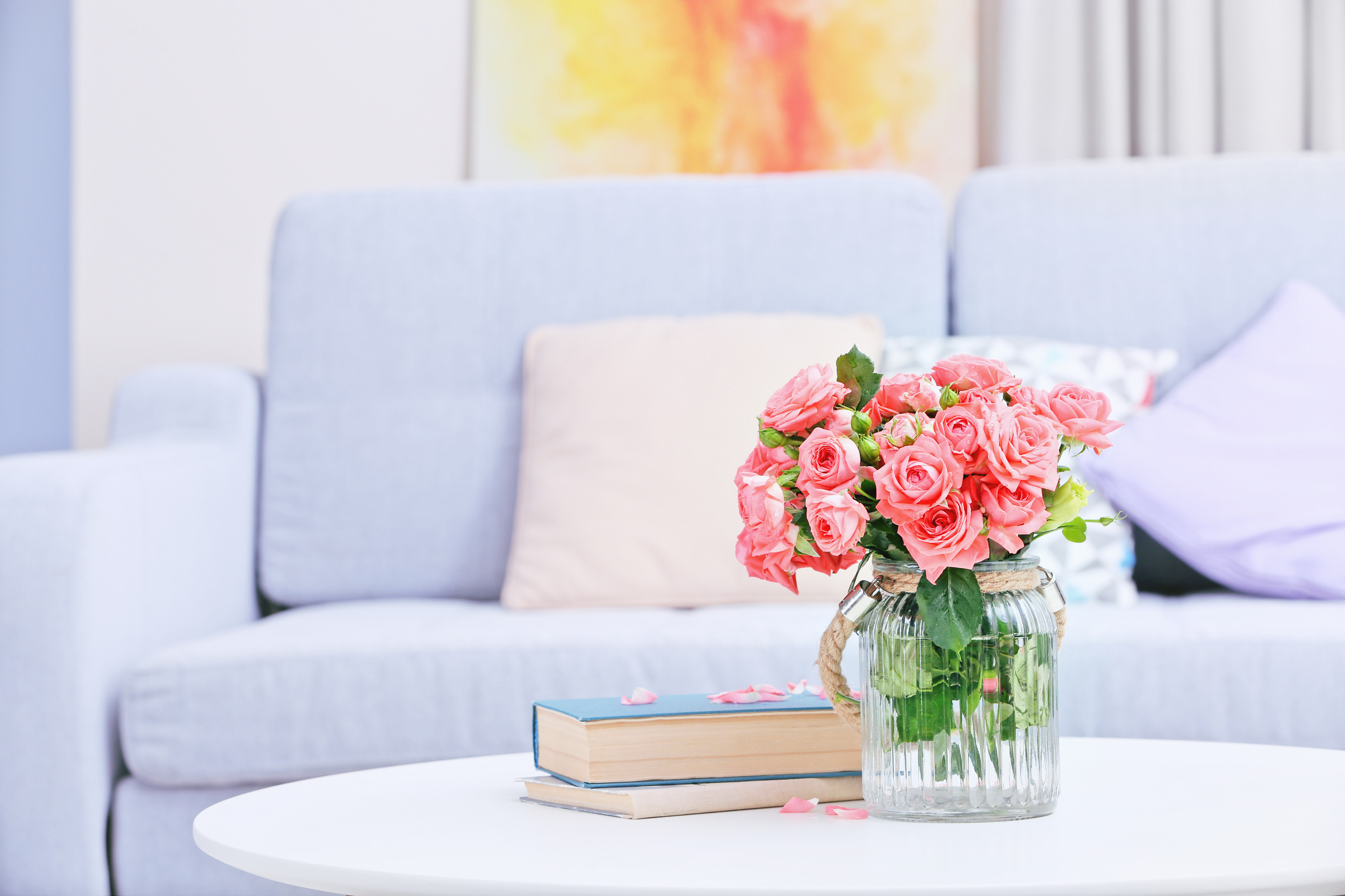 Roses in Vase on Table in Room