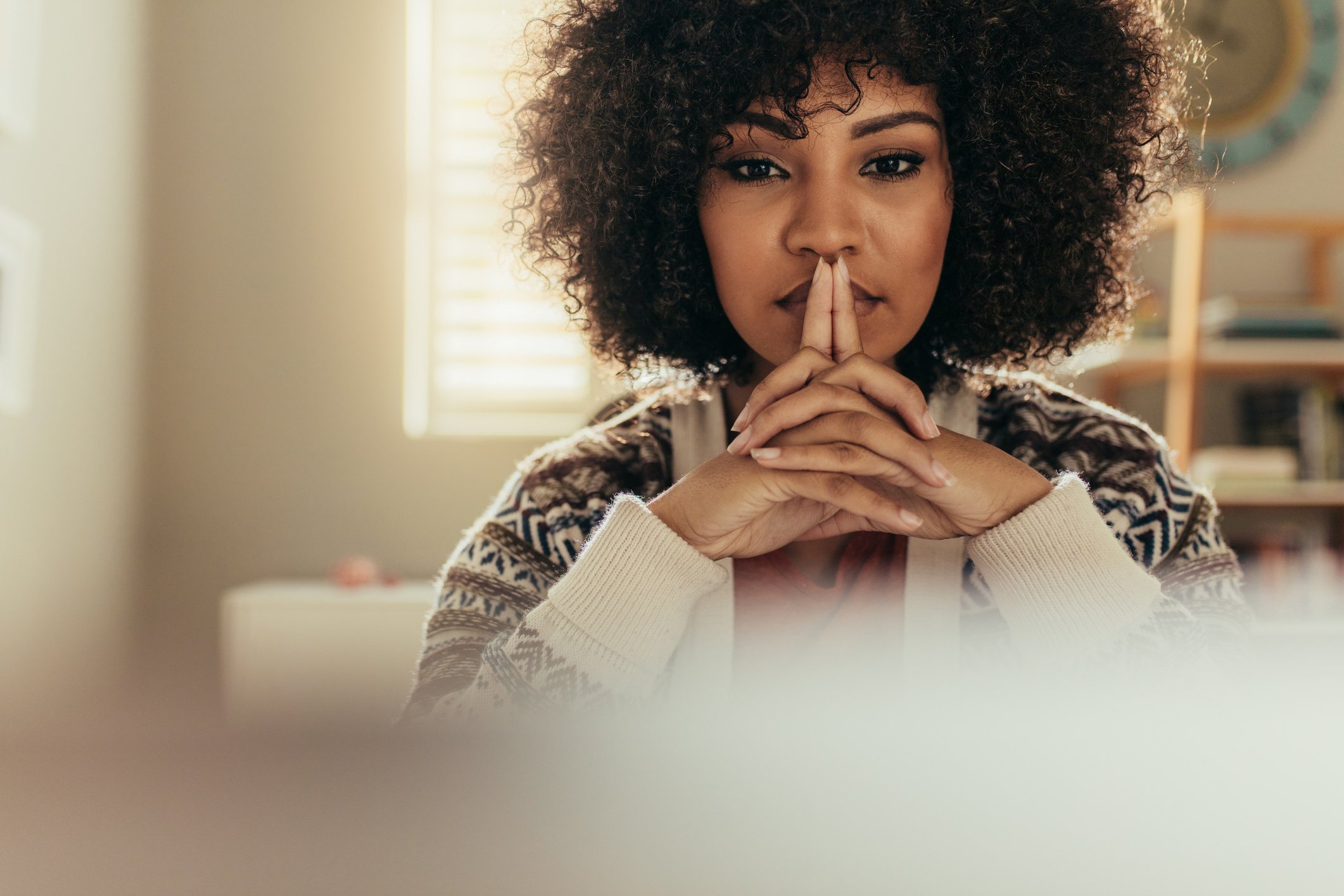 Thoughtful Womam at Her Desk